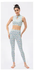 Detail of Chinese style yoga set featuring stand collar and blue floral print on white