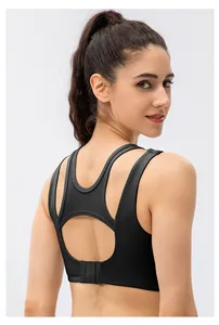Detail of racerback sports bra with mesh panel and adjustable back buckle closure