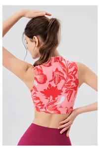 Rear view of floral yoga top with Chinese knot collar and padded athletic design