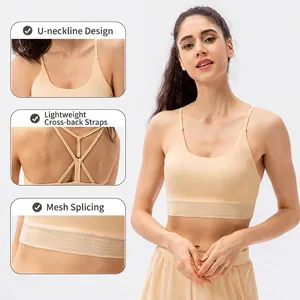 Women's beige yoga bra with U-neck, criss-cross straps and breathable mesh paneling
