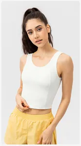 Close-up of white high-impact sports bra with seamless moisture-wicking fabric for yoga