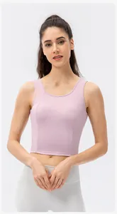 Detail view of pink high-impact sports bra with seamless round neck and slim fit design
