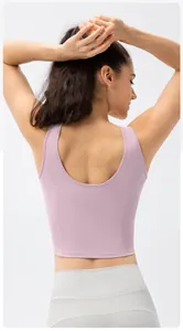 Detail view of purple high-impact sports bra showing the wide straps and U-shaped back design