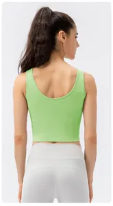 Rear view of a light green high-impact sports crop top with U-neck and wide straps