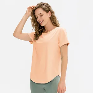 T-shirt yoga rosa arancio da donna e leggings verde oliva per fitness e corsa sport