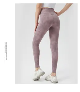 Detailed back view of high waist purple marble yoga pants showing lifting and V-shaped waistline
