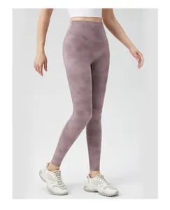 Detailed view of high-waist marble printed yoga leggings with seamless purple tie-dye fabric