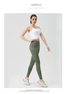 Detail of olive green tie-dye high-waisted yoga leggings and white cropped sports vest