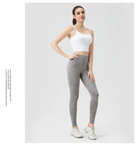 Close-up of high-waisted yoga leggings with grey tie-dye marble print and seamless finish
