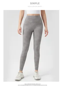 Detailed close-up of high-waist marble printed yoga leggings for women in grey tie-dye