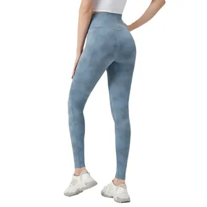 Blue tie-dye high-waisted yoga leggings for women featuring a seamless back lift design