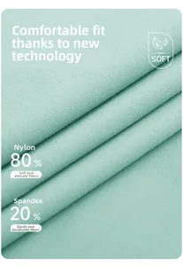 Dettaglio del tessuto verde menta in 80% nylon e 20% elastan per maglia da yoga