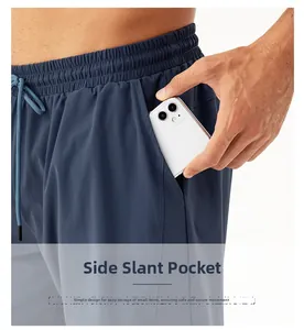 Men's sports shorts detail showing elastic waistband and side pocket for phone storage