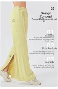 Detail view of high waist loose yoga pants featuring elastic waist and side leg slits