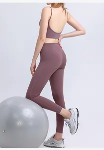Detail of high-waisted mauve yoga set with back-support sports bra and sculpting leggings