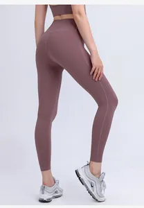 Close-up of high-waisted yoga leggings with side seam details in dusty mauve purple
