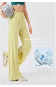 Macro detail of breathable cooling fabric and side slit design on high-waisted yoga pants
