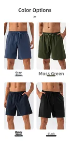 Detail view of quick-dry athletic shorts in greyish blue, moss green, navy, and black colors