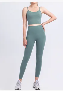Detail of high-waist yoga set in grey-green with V-neck sports bra and slim leggings