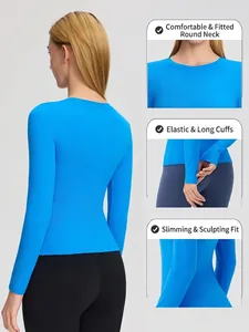 Haut de yoga bleu vif à manches longues, coupe ajustée, tissu élastique et col rond