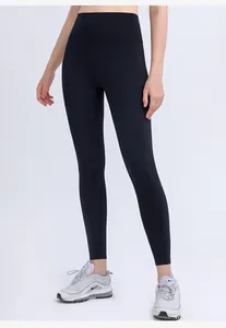 Detail of high-waist black yoga leggings featuring tummy control and elastic fitness fabric