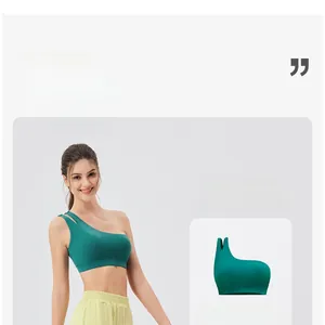 Detail of dark green one-shoulder yoga bra with hollow-out straps and loose yoga pants