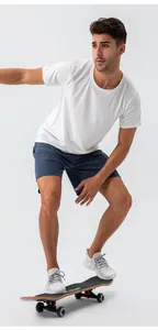 Dynamic lifestyle shot of breathable quick-dry sports set with skateboard on white background