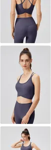 Détails du soutien-gorge de yoga dos croisé et legging en tissu extensible violet foncé