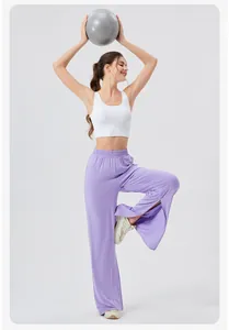 Detail of high-waist lavender yoga pants with side slits and breathable fabric drape