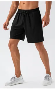 Men's black quick-dry shorts detail with elastic waist and adjustable drawstring