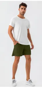 Front view of men's quick-dry sports outfit with white t-shirt and green shorts
