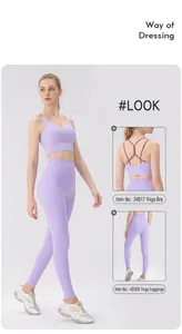 Detail view of purple yoga set featuring a cross-back sports bra and high-waisted leggings