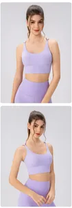 Detailed close-up of lavender high-stretch yoga set with cross-back sports bra and leggings