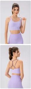 Front and back view of light purple yoga set with strappy sports bra and high waist leggings