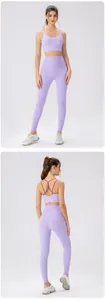 Detail view of lavender yoga set showing cross back straps and high waist leggings