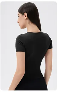 Slim fit black yoga short sleeve top with front zipper and supportive chest pads