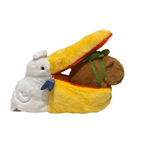 Creative pelican plush storage bag with a mini capybara inside on a white background