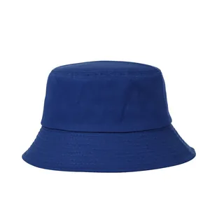 Detailed view of reinforced stitching on the brim of a navy blue cotton bucket hat