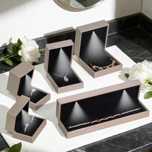 Premium champagne gold brushed leather LED jewelry gift box set with black velvet interior