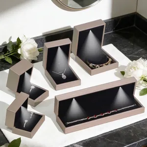 Premium champagne gold brushed leather LED jewelry gift box set with black velvet interior