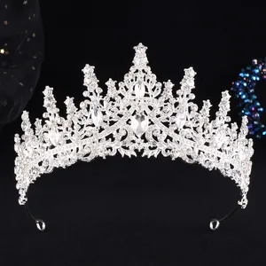 Silver bridal tiara with sparkling rhinestones and teardrop crystals for weddings