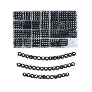 Detail view of 24-compartment storage box with black A-Z alphabet beads for DIY jewelry