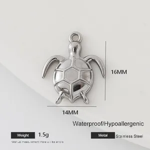 Macro shot of silver turtle pendant with dimensions 16mm x 14mm in stainless steel