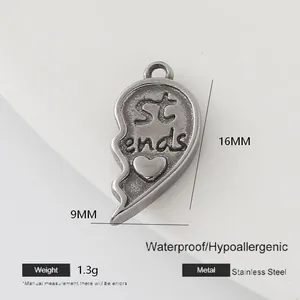 Macro view of 16mm stainless steel jigsaw heart charm with Best Friends engraving