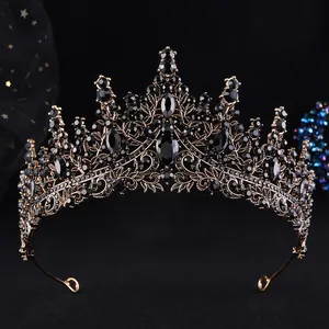 Close-up of vintage bronze bridal crown featuring intricate black rhinestones and gems