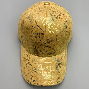 Detail of golden street-style baseball cap with graffiti prints and Love You lettering