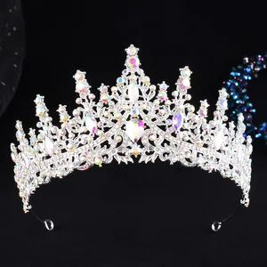 Detailed macro of silver bridal crown with colorful rhinestones and teardrop gem