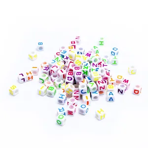 Macro detail of colorful A-Z square acrylic alphabet beads for DIY jewelry making