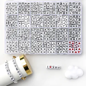 DIY jewelry kit with square A-Z alphabet beads and heart charms in a plastic box
