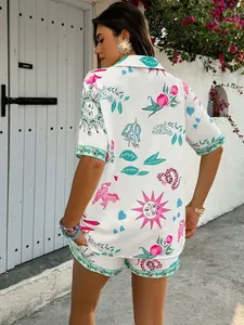 Close-up of colorful doodle print on a summer shirt set with delicate woven edging